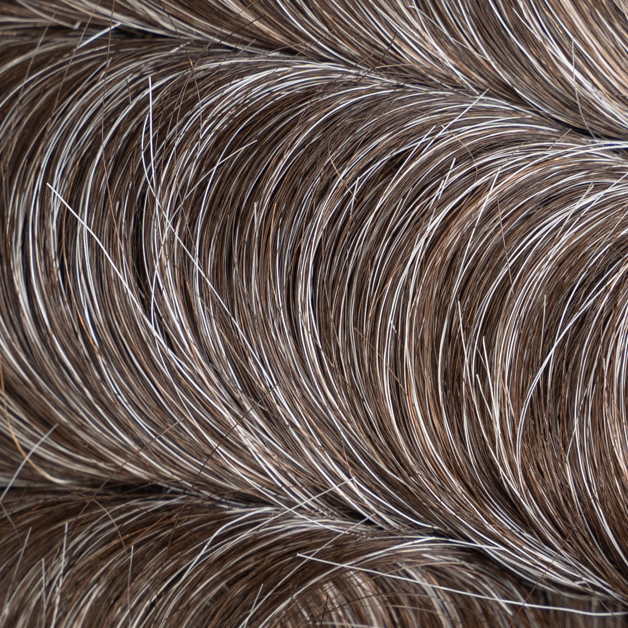 High-quality, medium density Poly Hair System for natural-looking hair replacement