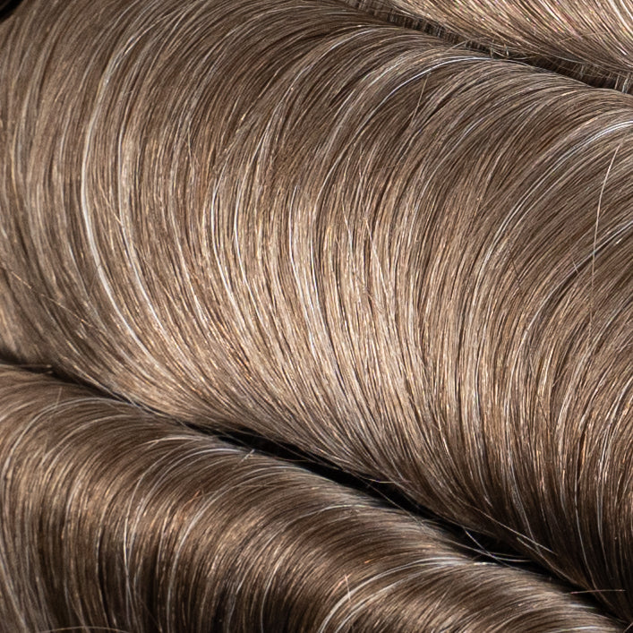 High-quality medium density Poly Hair System designed for natural-looking hair replacement