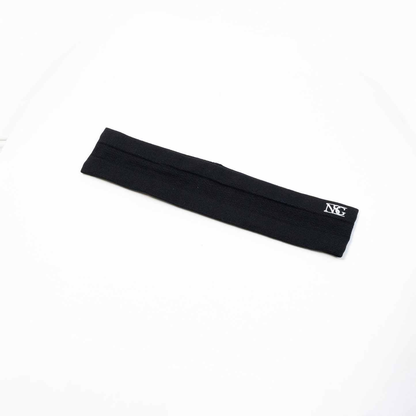 Adjustable NSG Headband in red with non-slip grip for sports