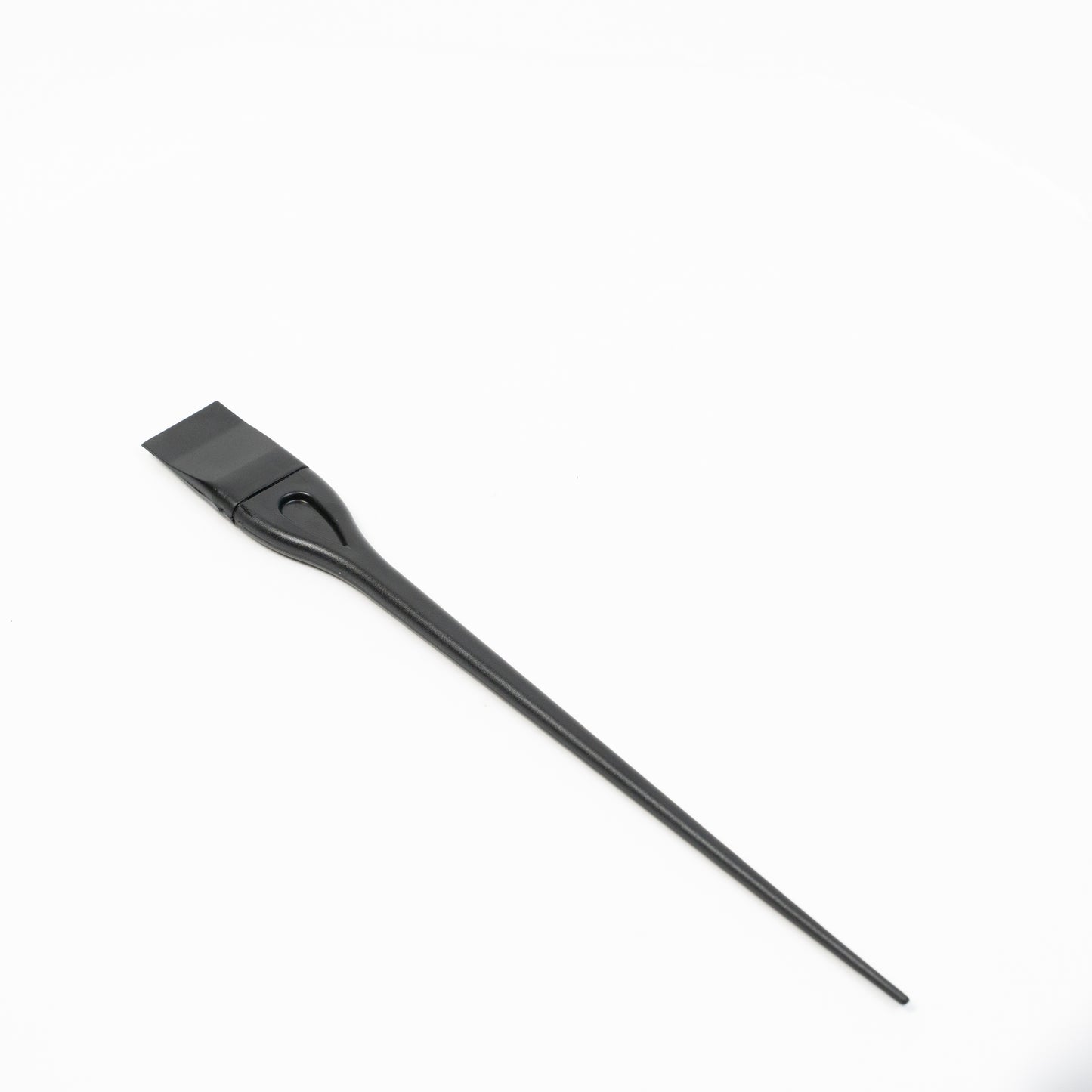 Black spatula with ergonomic handle and silicone head for non-stick pans