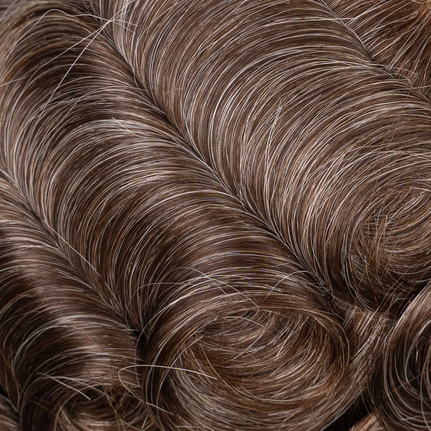 A high-quality lace hair system with medium density for a natural look