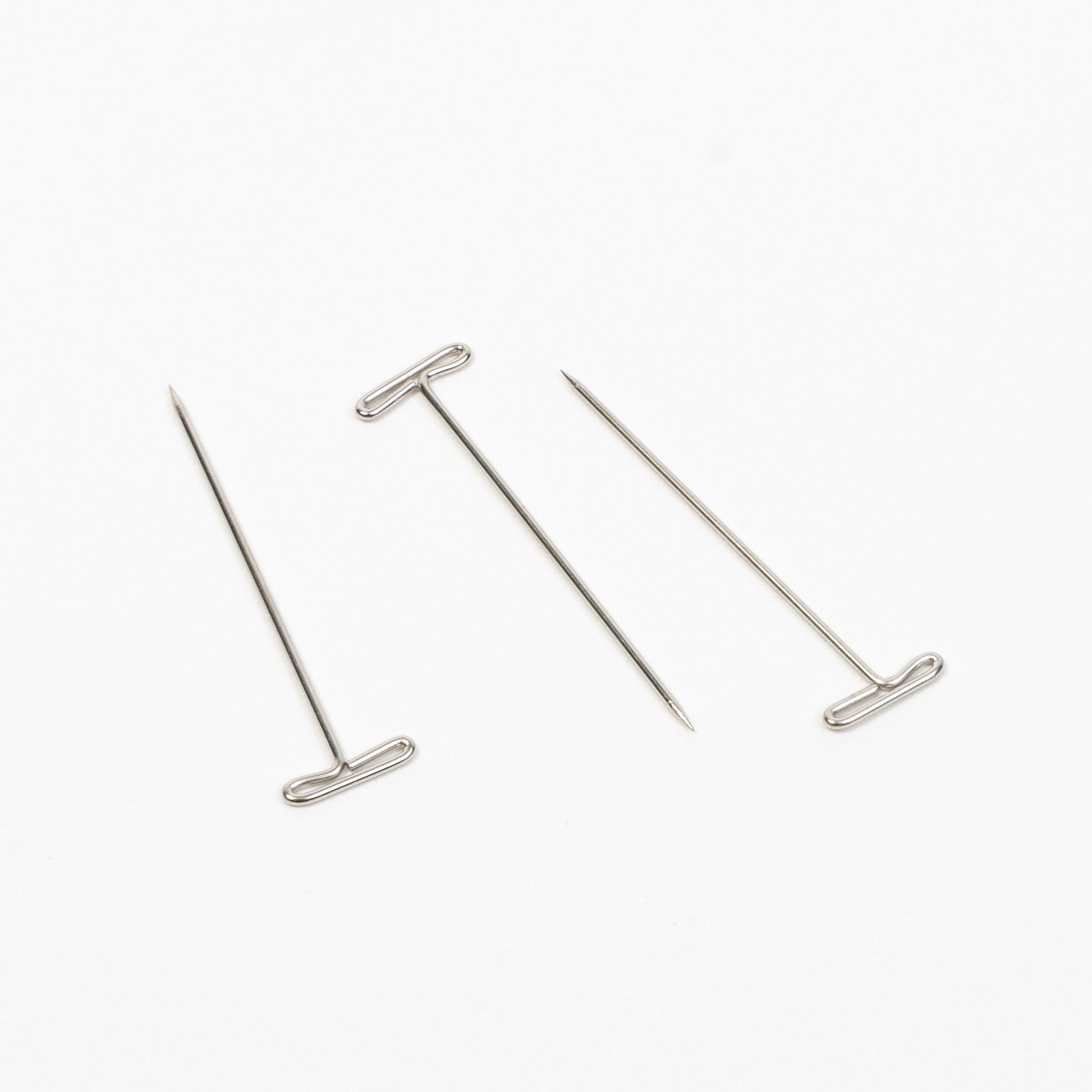 Pack of T-Pins for securing documents and fabric to surfaces